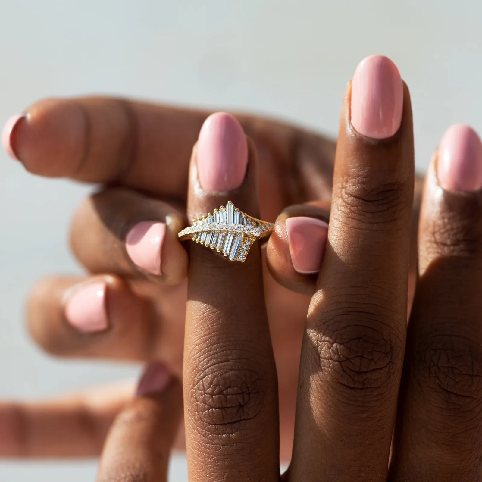 Asymmetrical Baguette Cluster Ring with Round Diamond Beams