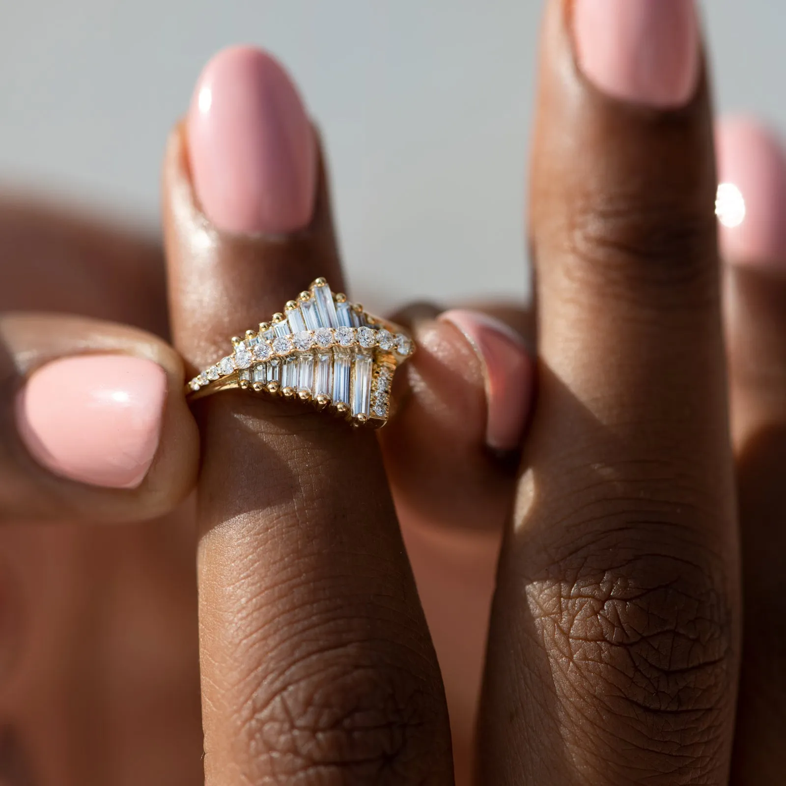 Asymmetrical Baguette Cluster Ring with Round Diamond Beams