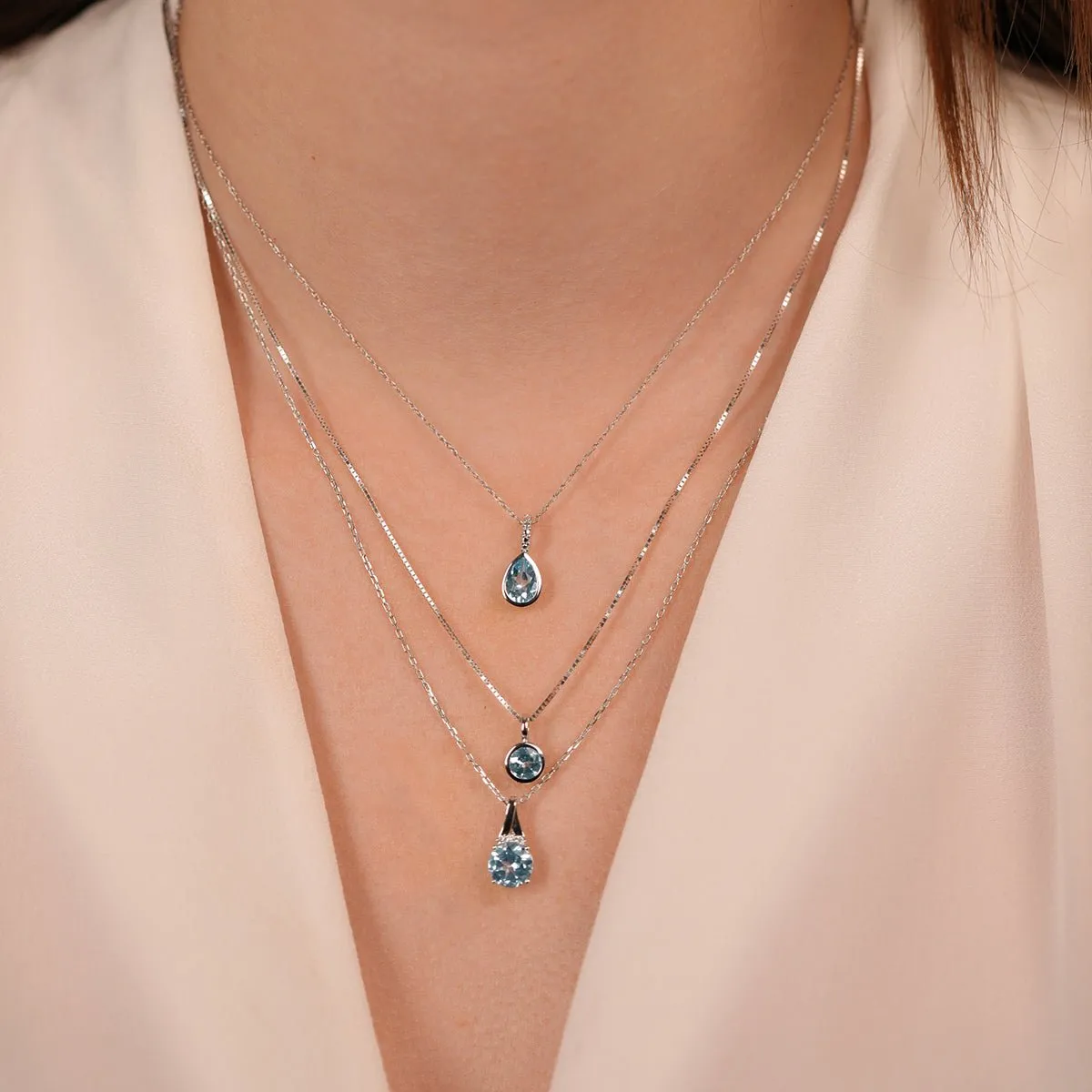 Round Blue Topaz Pendant Necklace with Diamonds