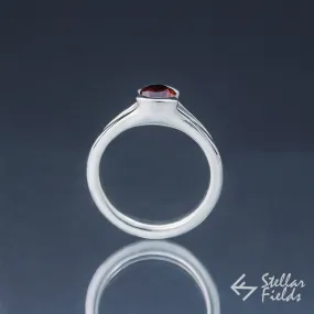 Tension Set Unique Round Red Garnet Ring